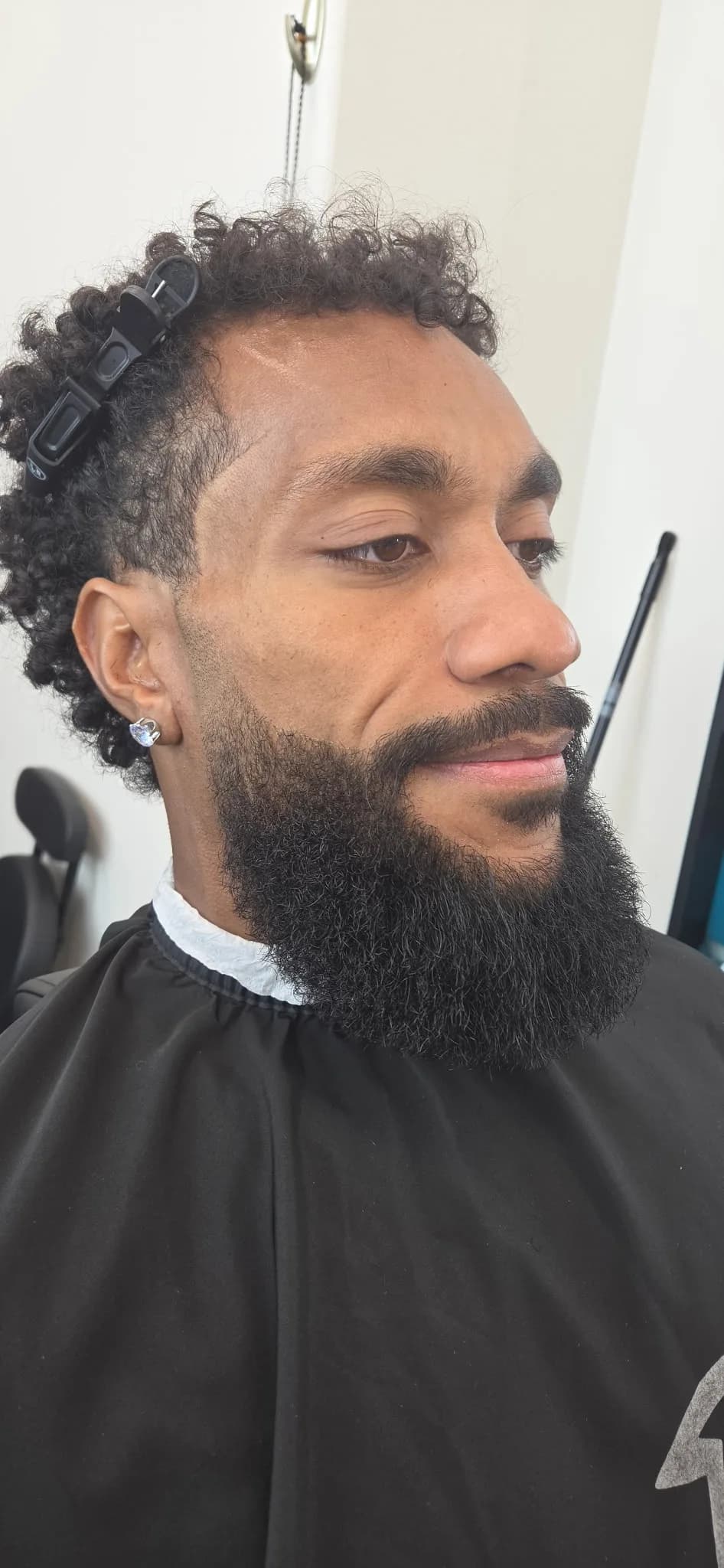 Detailed full beard trim and crisp line-up
