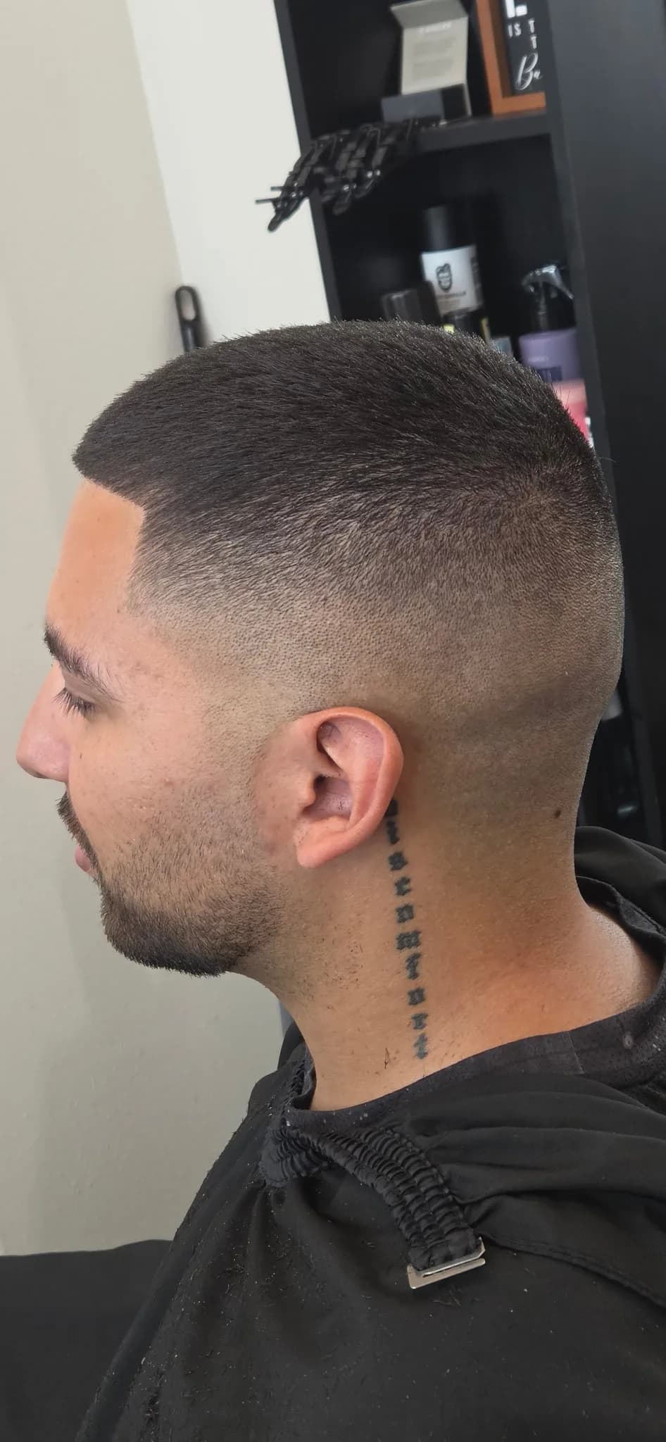 Sharp buzz cut with a smooth skin fade